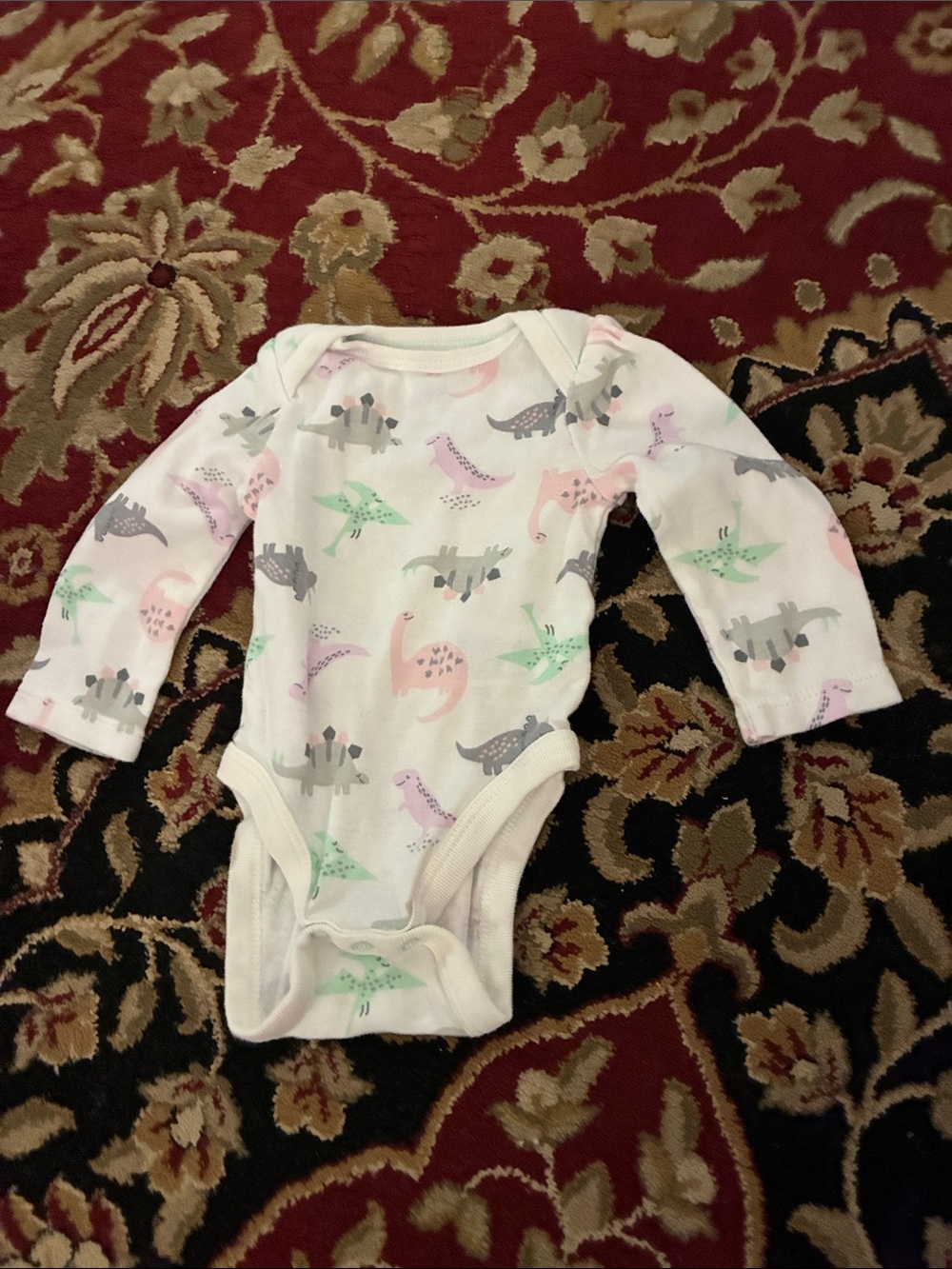 cloud island White Long-Sleeve Baby One-Piece with Pastel Dinosaur Prints